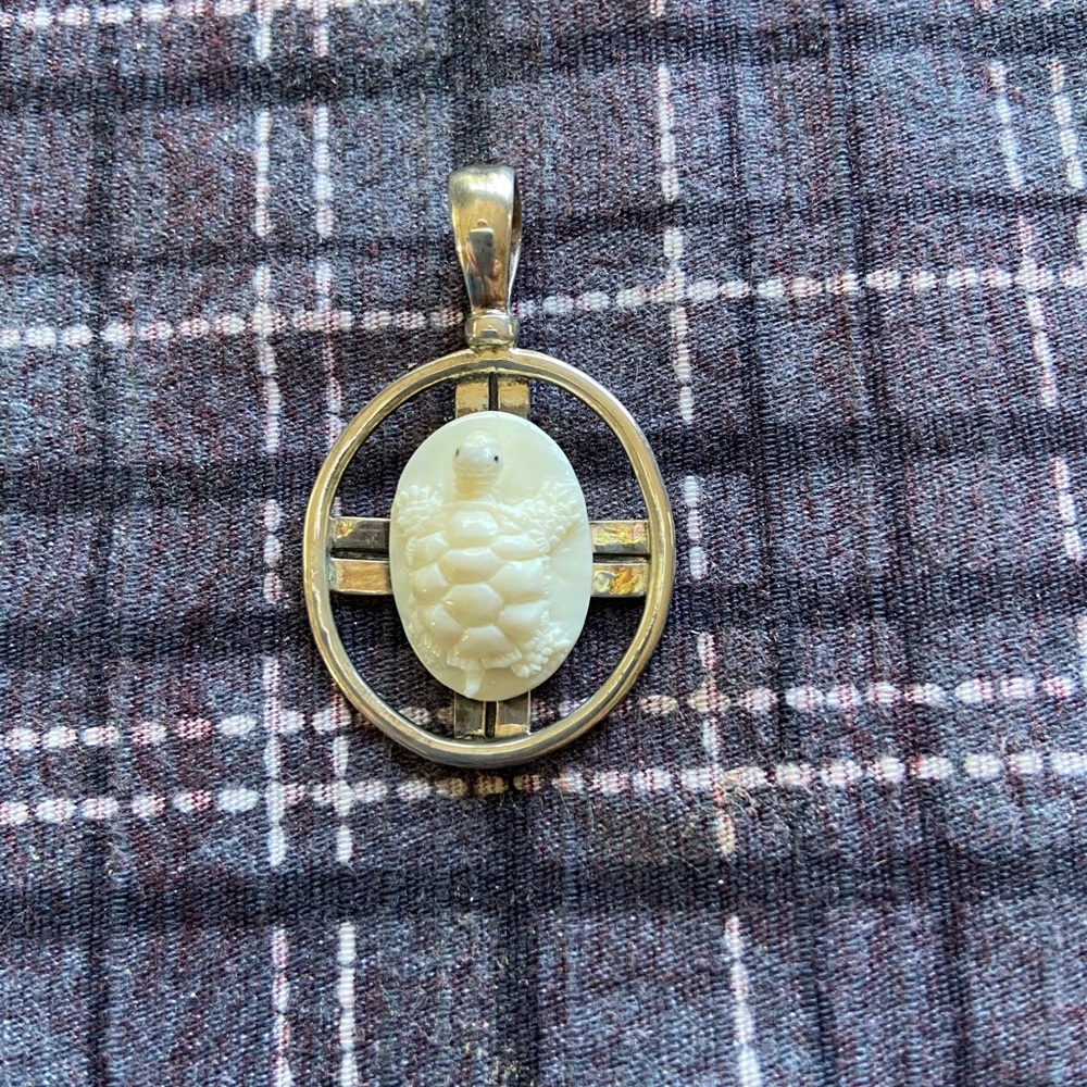 Carved mammoth turtle pendant